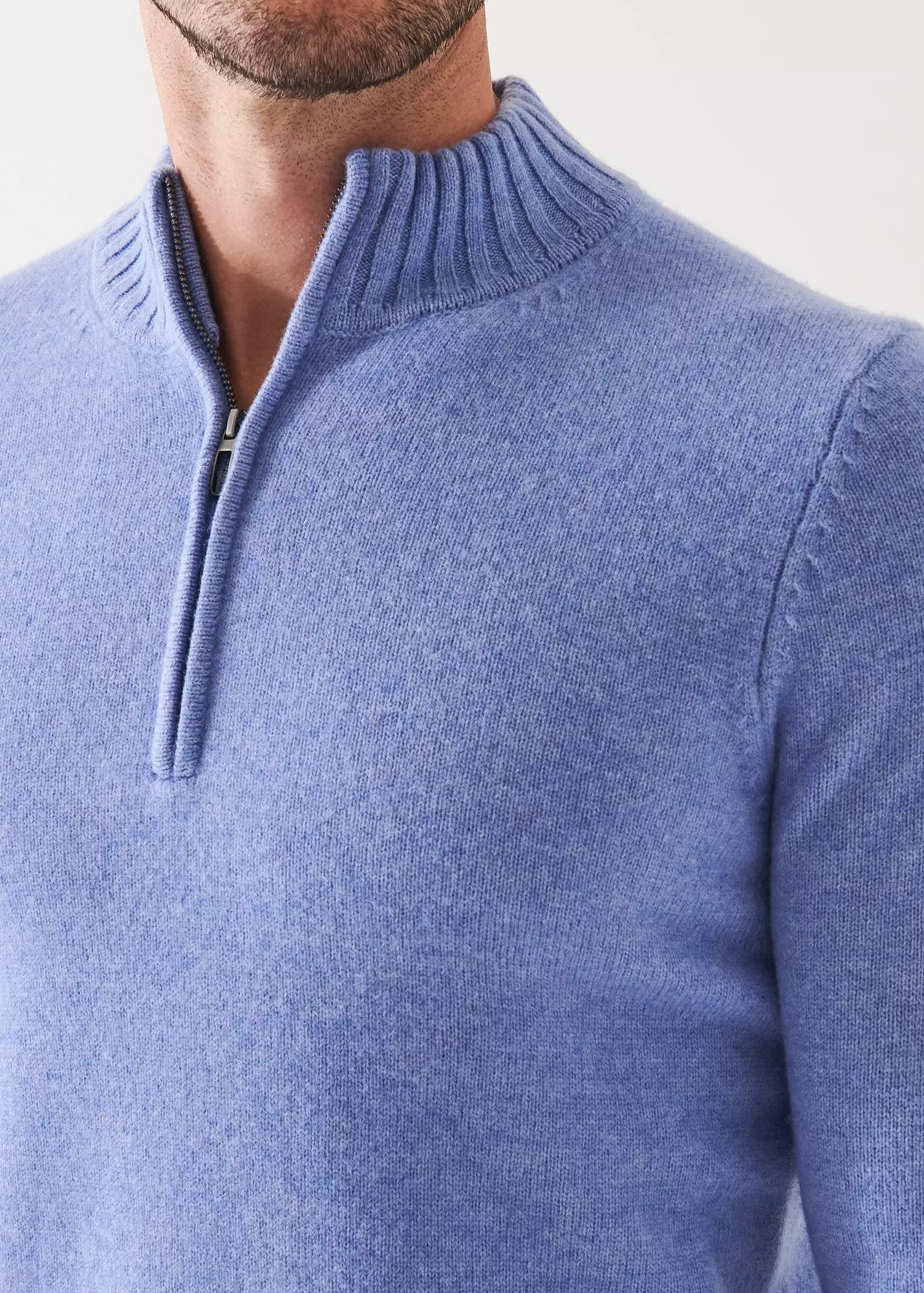 MERINO QUARTER ZIP SWEATER