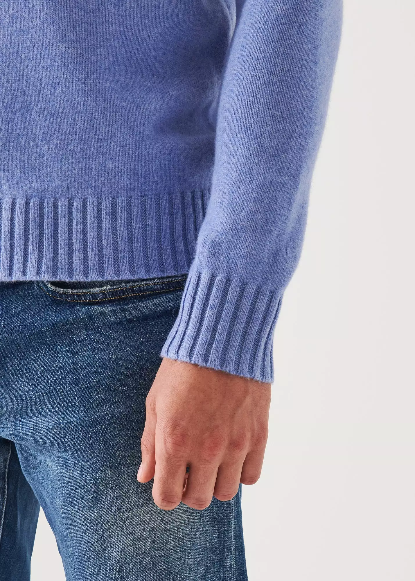 MERINO QUARTER ZIP SWEATER