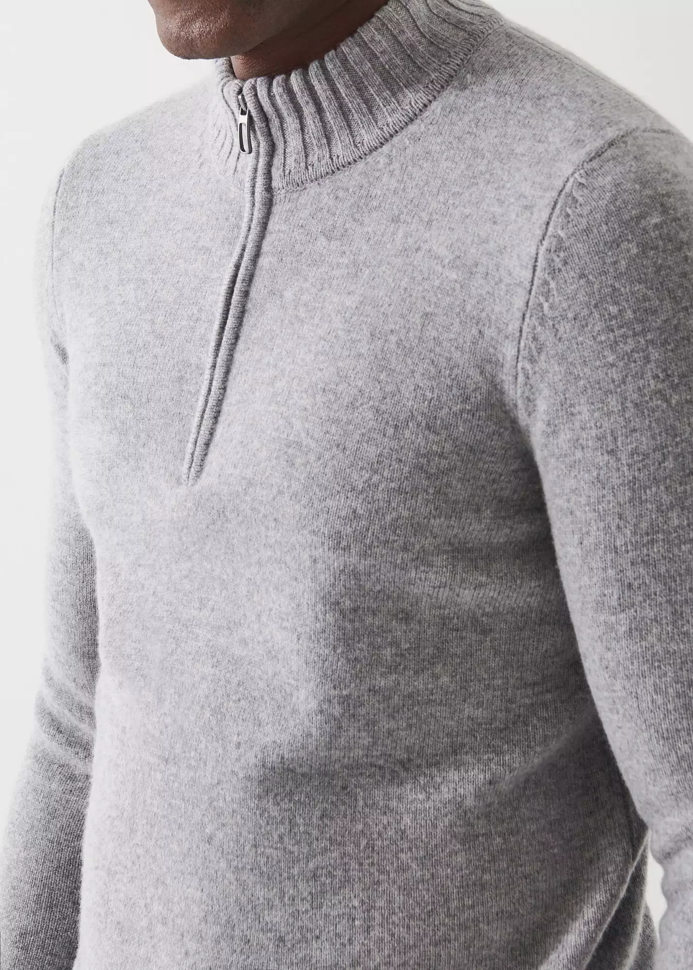 MERINO QUARTER ZIP SWEATER