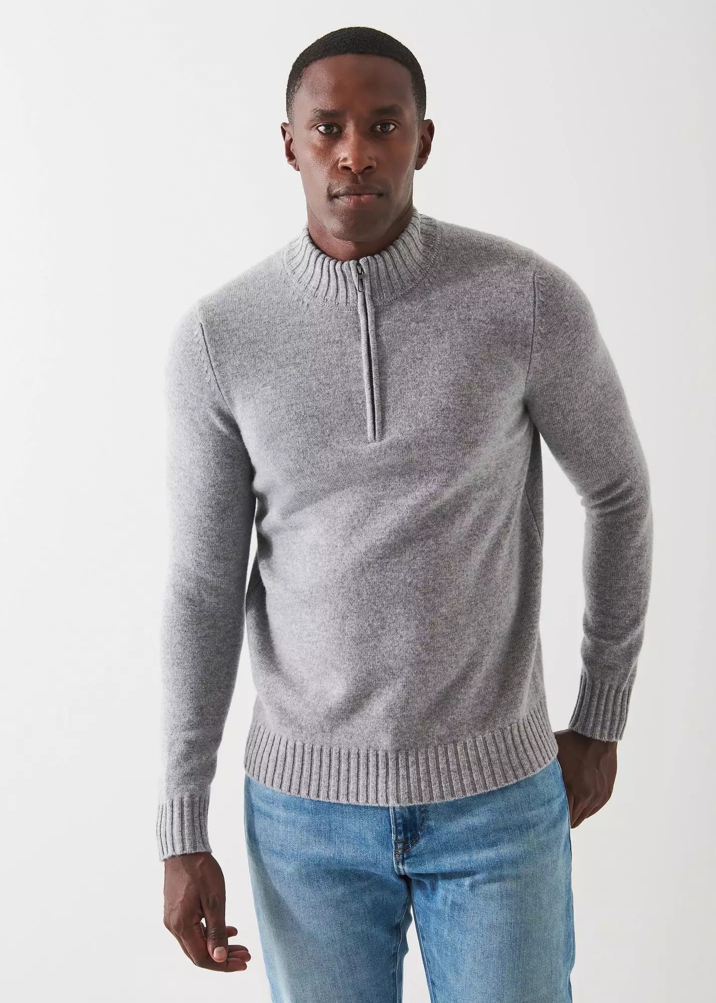 MERINO QUARTER ZIP SWEATER