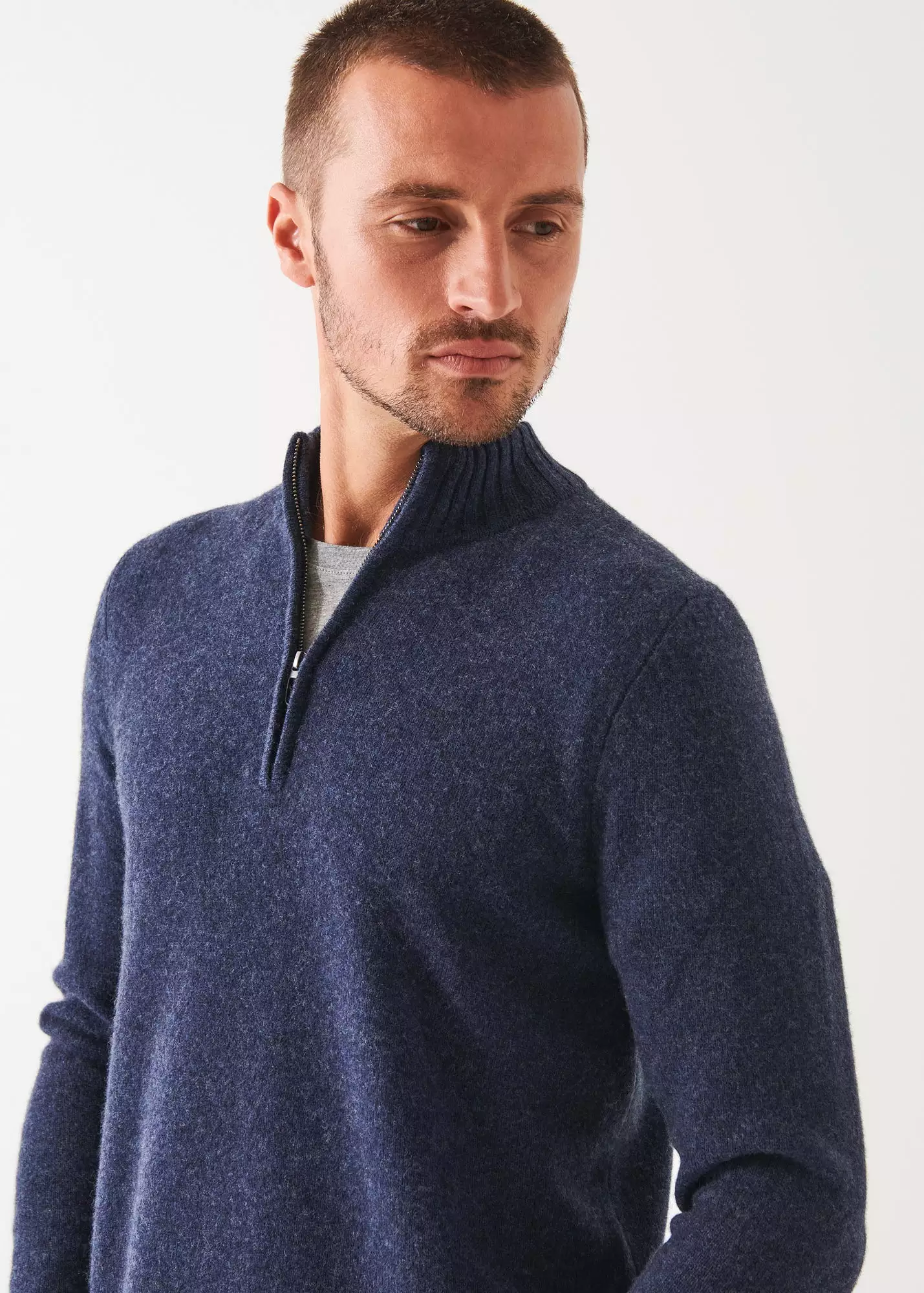 MERINO QUARTER ZIP SWEATER